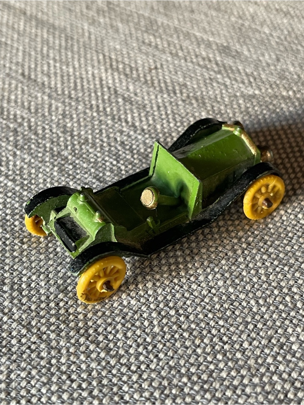 Vintage metal diecast car, made in England stamped on the bottom